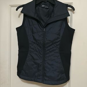 Women’s small, fitted, light-weight MARMOT vest.